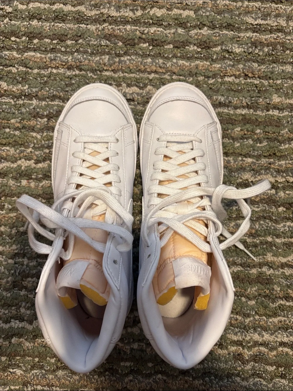 All White High-Top Nike Blazer Sneakers